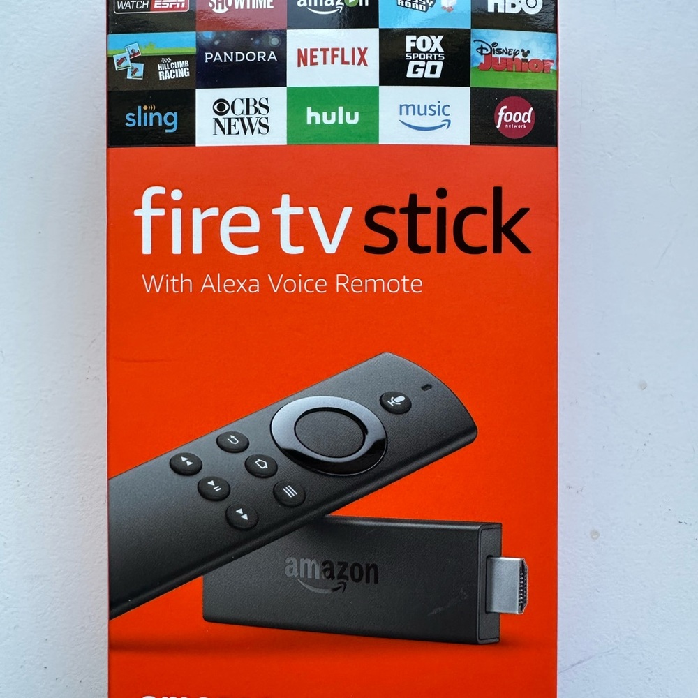 Amazon Fire TV Stick with Alexa Voice Remote - Black and Orange Packaging